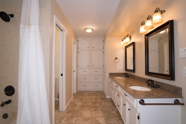 bathroom featuring vanity and shower / bath combo