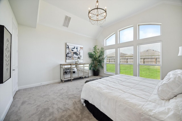 carpeted bedroom featuring lofted ceiling, a notable chandelier, and crown molding