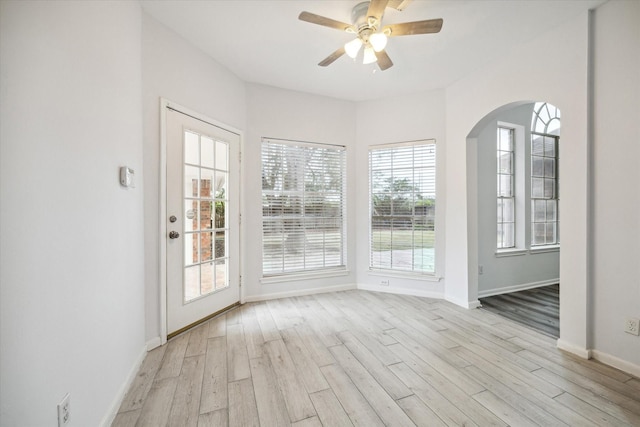 interior space with ceiling fan and light wood-type flooring