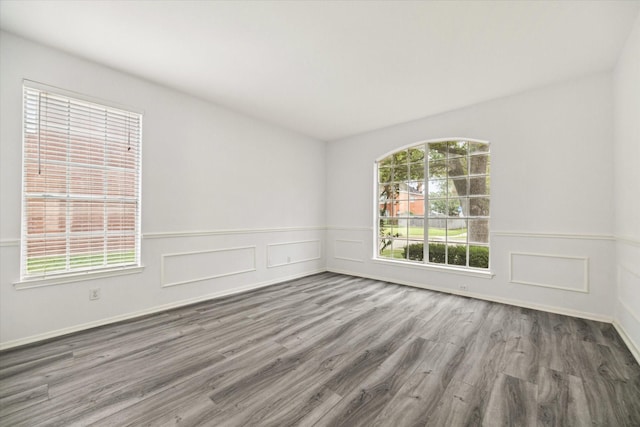 spare room featuring hardwood / wood-style floors