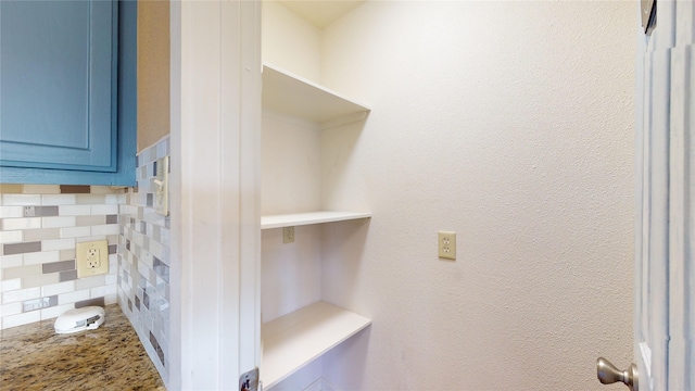 interior space featuring backsplash