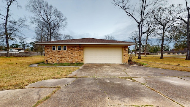 garage featuring a yard