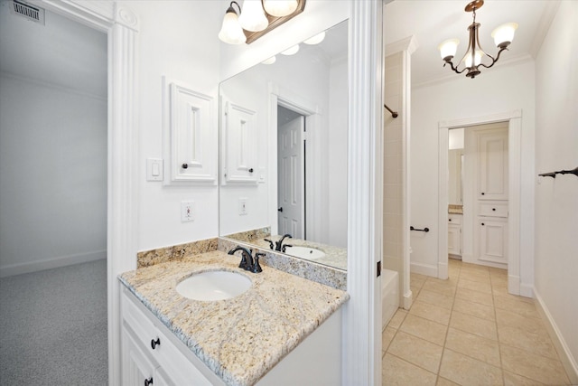 bathroom featuring an inviting chandelier, shower / tub combination, ornamental molding, vanity, and tile patterned flooring