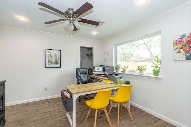 office area featuring crown molding, ceiling fan, and dark hardwood / wood-style floors