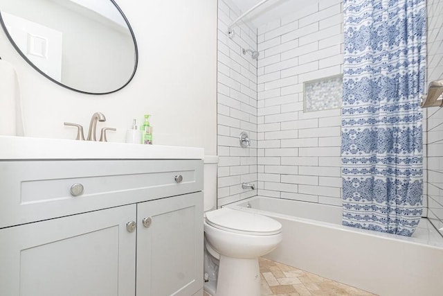 full bathroom with shower / bath combination with curtain, vanity, and toilet