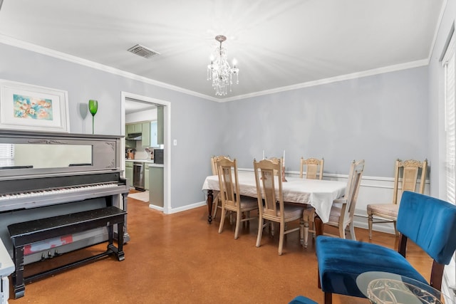 dining space with crown molding and a chandelier