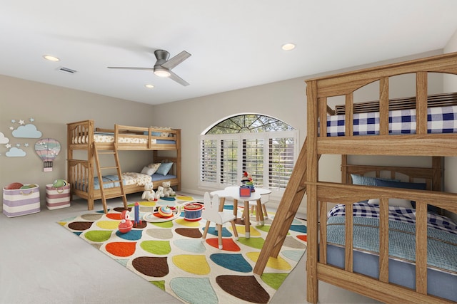 carpeted bedroom with ceiling fan