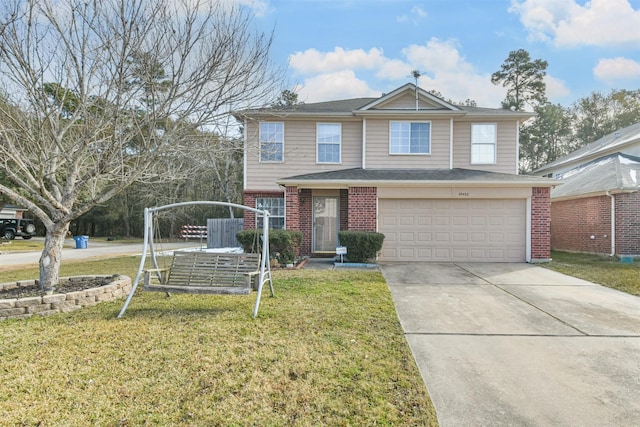 view of front of home featuring a garage and a front yard