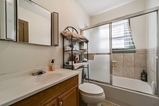 5411 Pecan St, Crosby, TX 77532 - full bathroom with vanity, toilet, and combined bath / shower with glass door