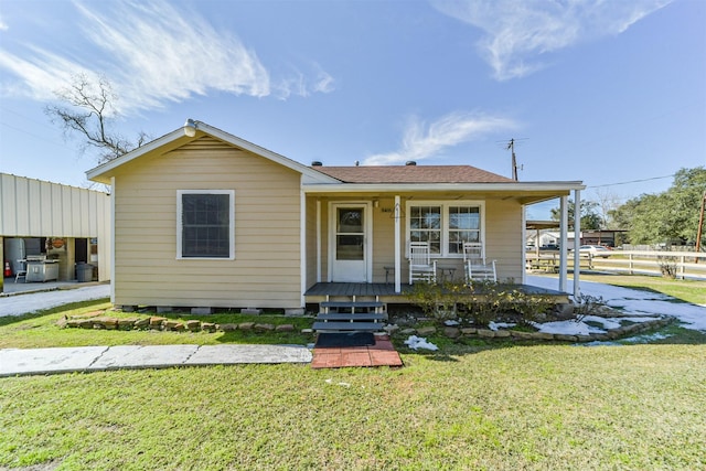 view of front facade with a porch and a front yard