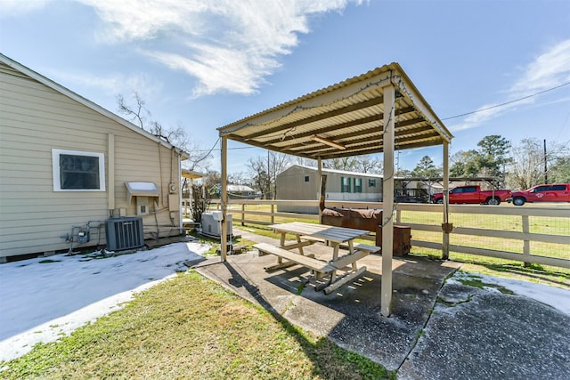 5411 Pecan St, Crosby, TX 77532 - view of yard featuring central AC unit and a patio area