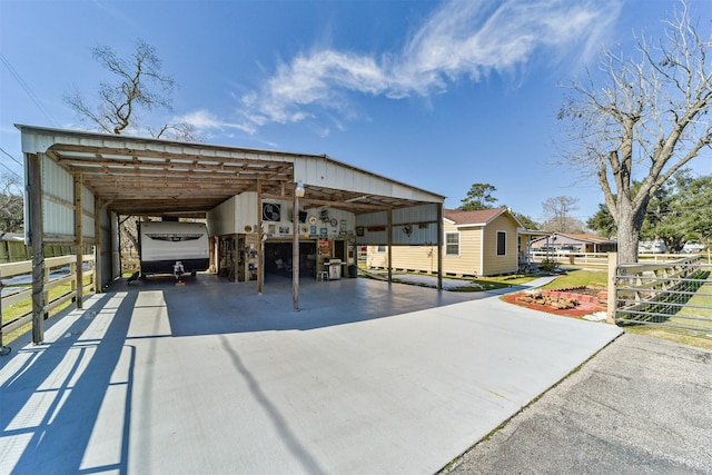 5411 Pecan St, Crosby, TX 77532 - exterior space featuring a carport