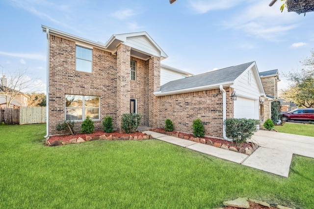 view of front of property with a garage and a front yard