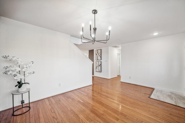 dining room with a notable chandelier and light hardwood / wood-style floors