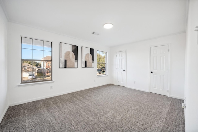 unfurnished room with carpet flooring