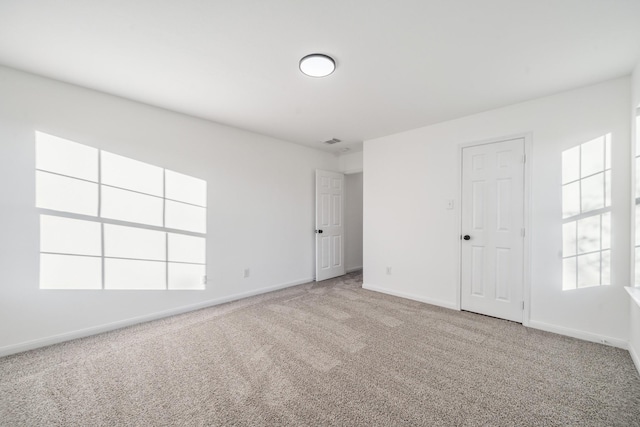 view of carpeted spare room