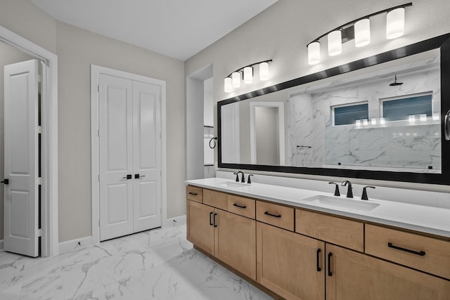 bathroom with vanity and a shower