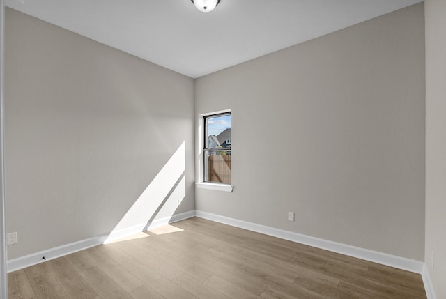 empty room with light wood-type flooring