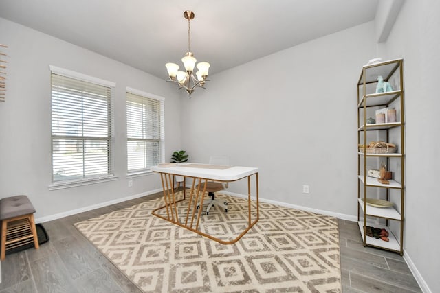 office area with hardwood / wood-style flooring and a chandelier