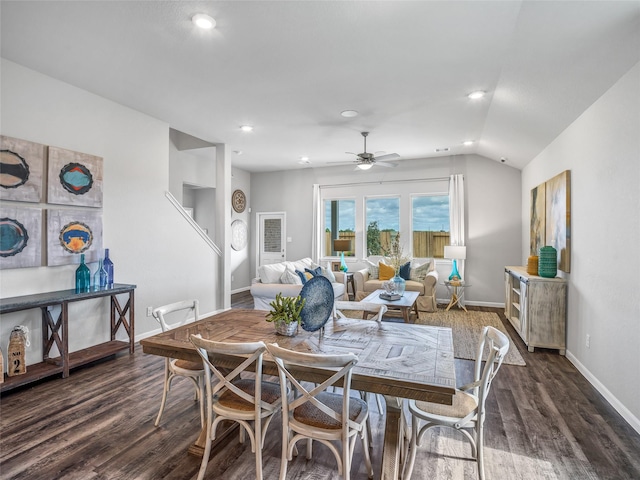 dining area with lofted ceiling, dark wood-type flooring, and ceiling fan