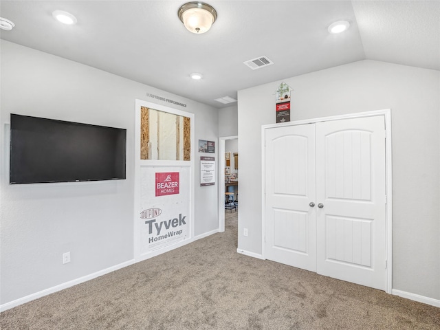 27014 Costa Creek Dr, Katy, TX 77493 - unfurnished bedroom with carpet floors, baseboards, a closet, recessed lighting, and vaulted ceiling