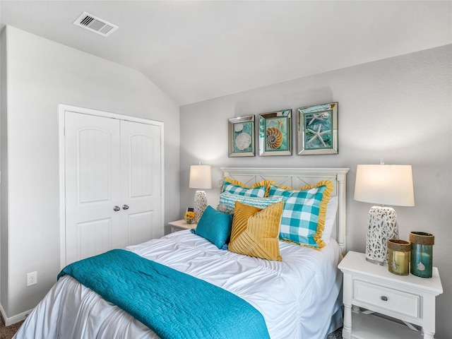 27014 Costa Creek Dr, Katy, TX 77493 - bedroom with lofted ceiling, a closet, and baseboards