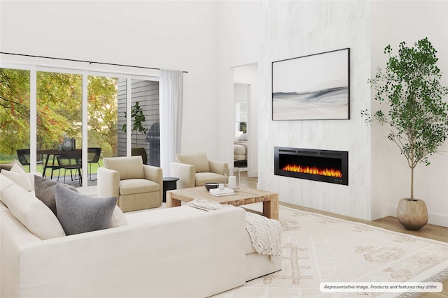 living room with hardwood / wood-style flooring and a fireplace