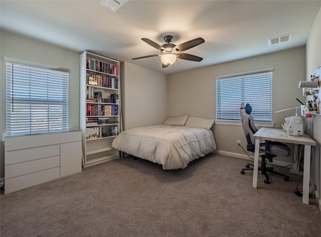 carpeted bedroom with ceiling fan