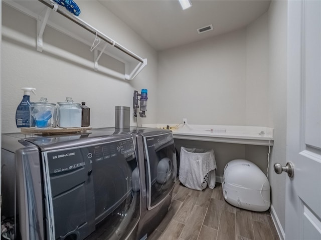 laundry room featuring washer and dryer