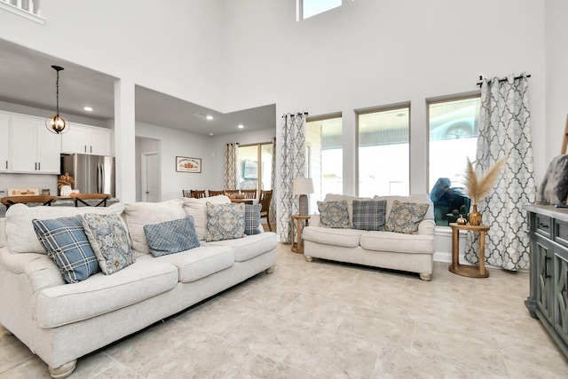 living room with a high ceiling