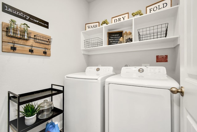 washroom featuring washer and dryer