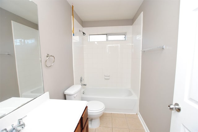 full bathroom with tiled shower / bath, tile patterned floors, toilet, and vanity