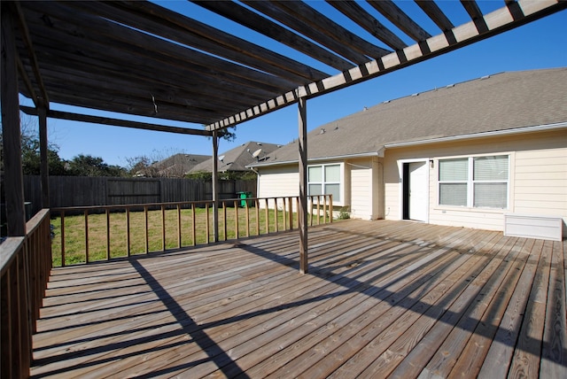 deck with a yard and a pergola