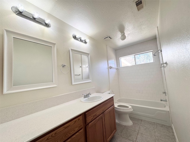 full bath featuring shower / washtub combination, visible vents, toilet, vanity, and a textured ceiling