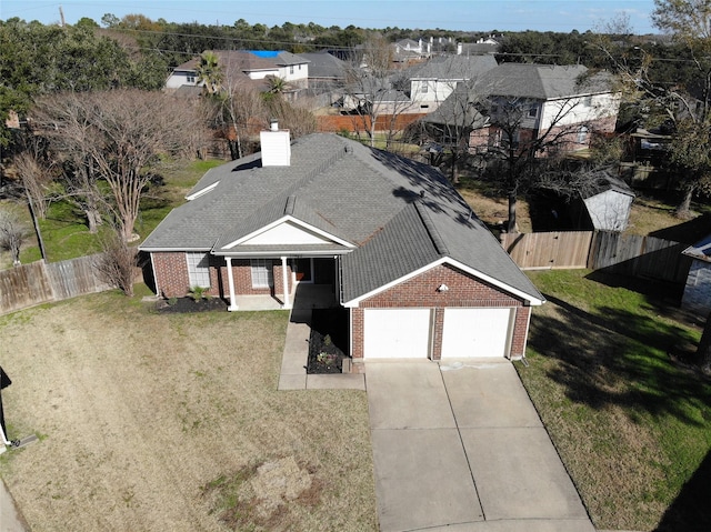 drone / aerial view with a residential view