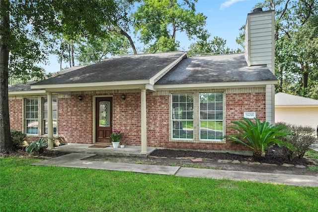 ranch-style house with a front lawn