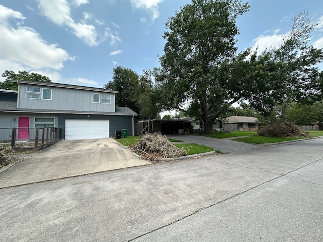 view of front of home with a garage