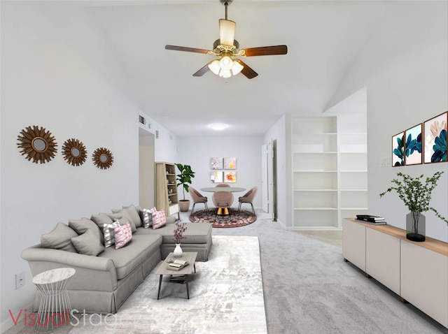 carpeted living room featuring ceiling fan and built in features