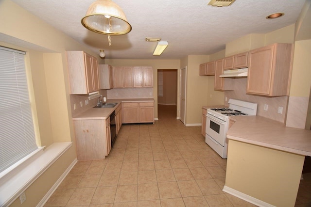 kitchen featuring light tile patterned floors, white gas range oven, dishwasher, tasteful backsplash, and light brown cabinets