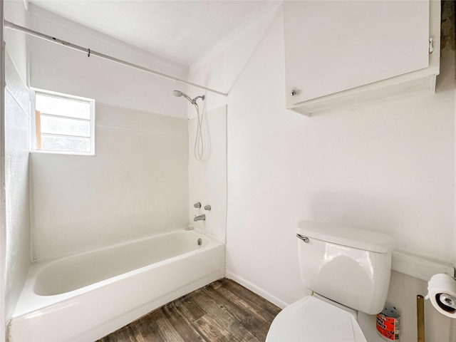 bathroom featuring shower / tub combination, wood-type flooring, and toilet