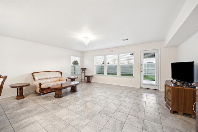 living area featuring light tile patterned floors