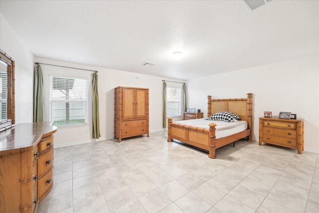 bedroom with a textured ceiling