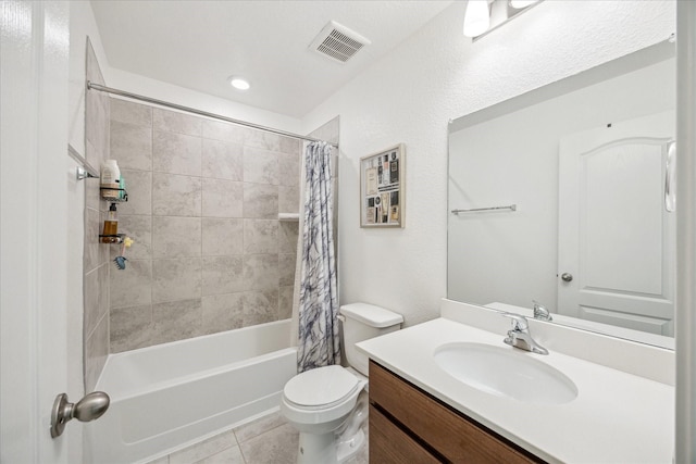 full bathroom with vanity, tile patterned floors, shower / bath combination with curtain, and toilet