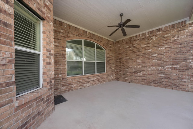 view of patio / terrace featuring ceiling fan