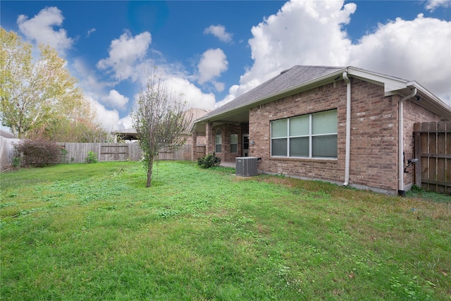 view of yard with central AC