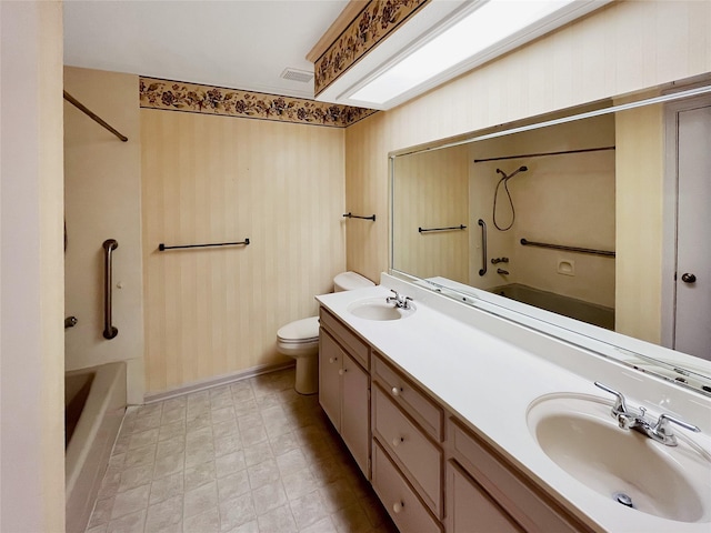 full bathroom with toilet, vanity, and bathtub / shower combination