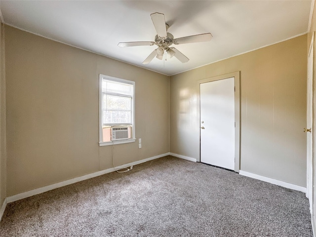 unfurnished bedroom featuring cooling unit, ceiling fan, and carpet