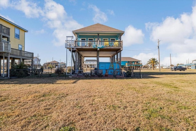 rear view of house with a lawn