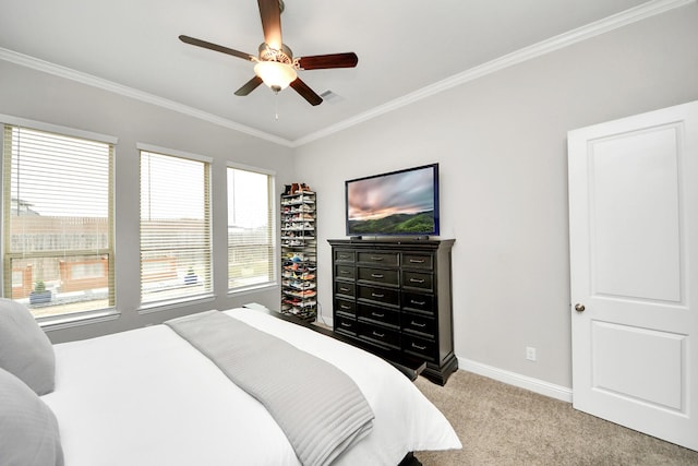 bedroom with light carpet, ornamental molding, and ceiling fan