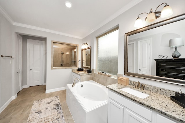 bathroom featuring ornamental molding, shower with separate bathtub, and vanity